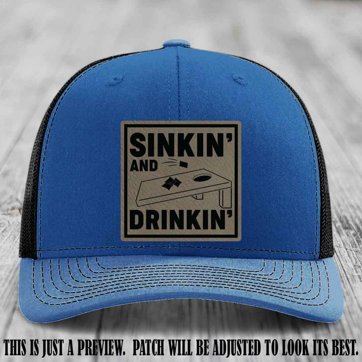 Sinkin' and Drinkin' design on Light Brown to Black Patch, Richardson 112 Royal to Black Hat