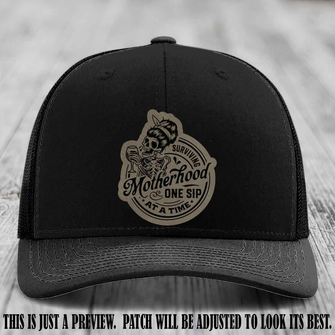 Surviving Motherhood One Sip at a Time Light Brown to Black Patch on Richardson 112 Hat - Black Hat