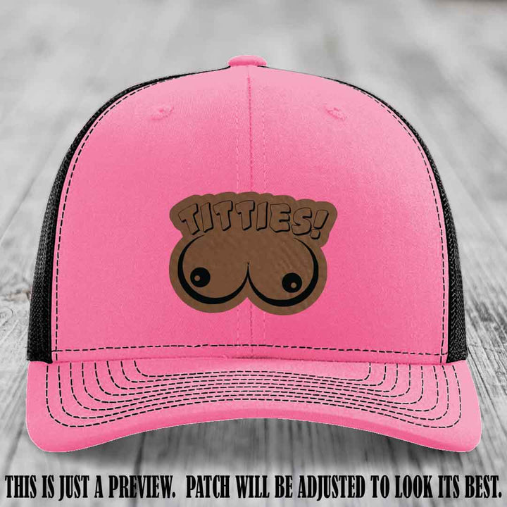 TITTIES! leather patch on Dark Brown to Black Patch mounted on a Hot Pink to Black Hat – Richardson 112 funny trucker hat