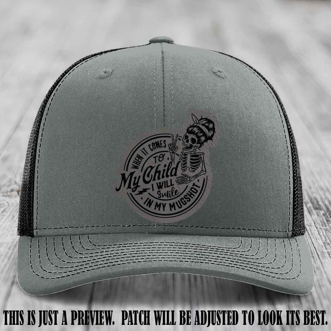 Richardson 112 custom trucker hat with grey to black patch and 'My Child Mugshot' leather patch on heather grey to black hat