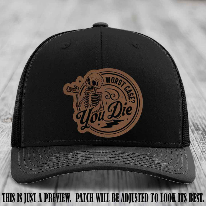 Richardson 112 Black Hat with Dark Brown to Black Patch featuring skeleton and phrase 'Worst Case? You Die'