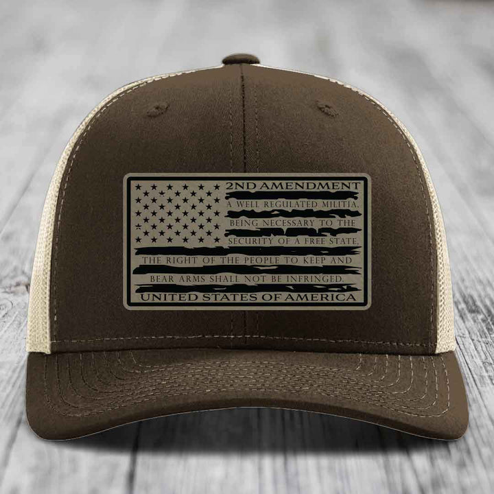 Brown trucker hat with a 2nd Amendment patch featuring the American flag design and text.
