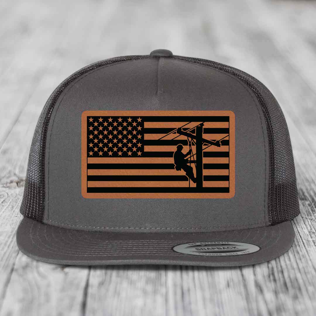 American Flag Lineman - Leather Patch Hat - Rawhide to Black Patch - Yupoong 6006 Snapback Flatbill Hat
