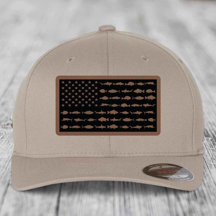 Beige baseball cap with American flag patch made of fish silhouettes and stars.