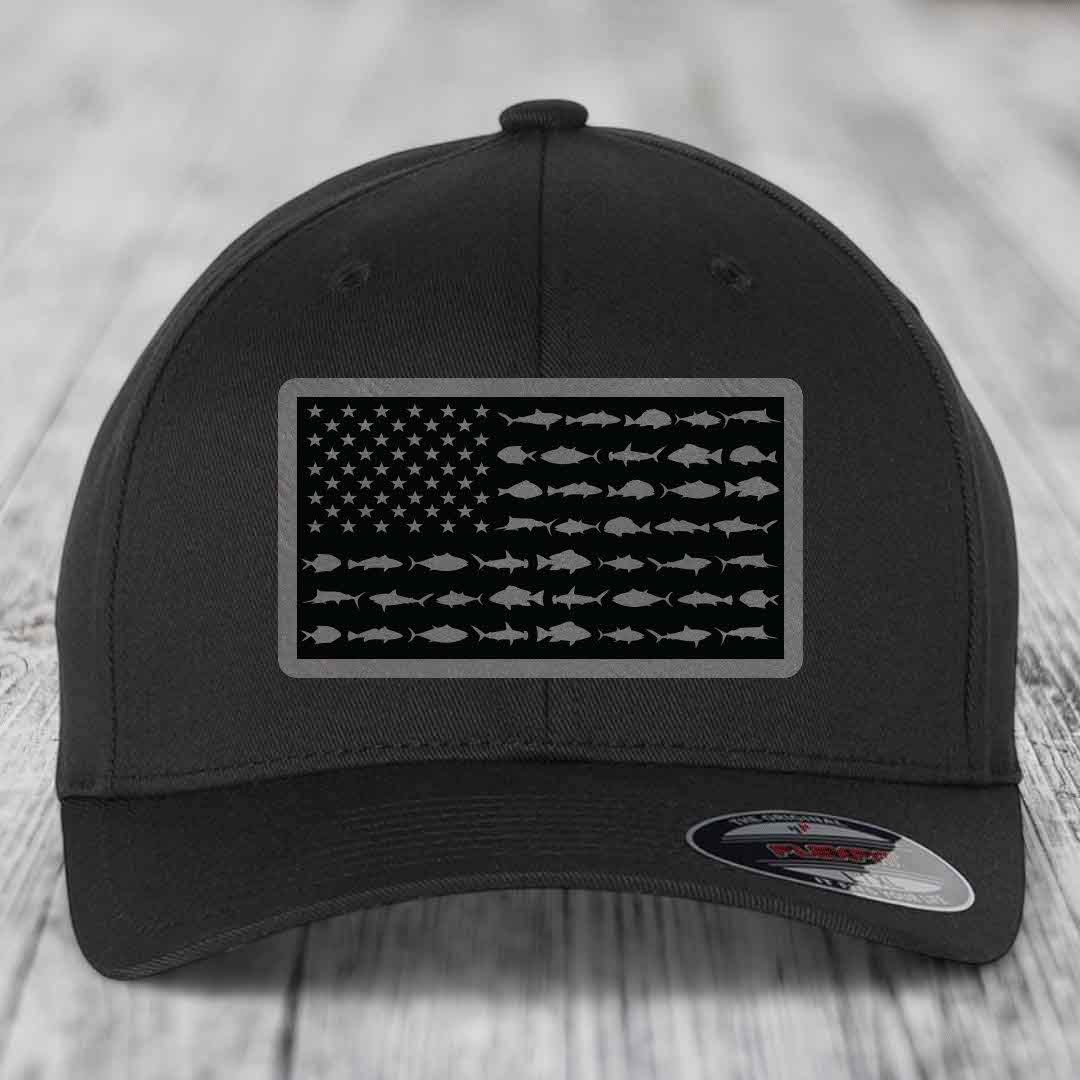 Black baseball cap with American flag patch made of saltwater fish silhouettes.