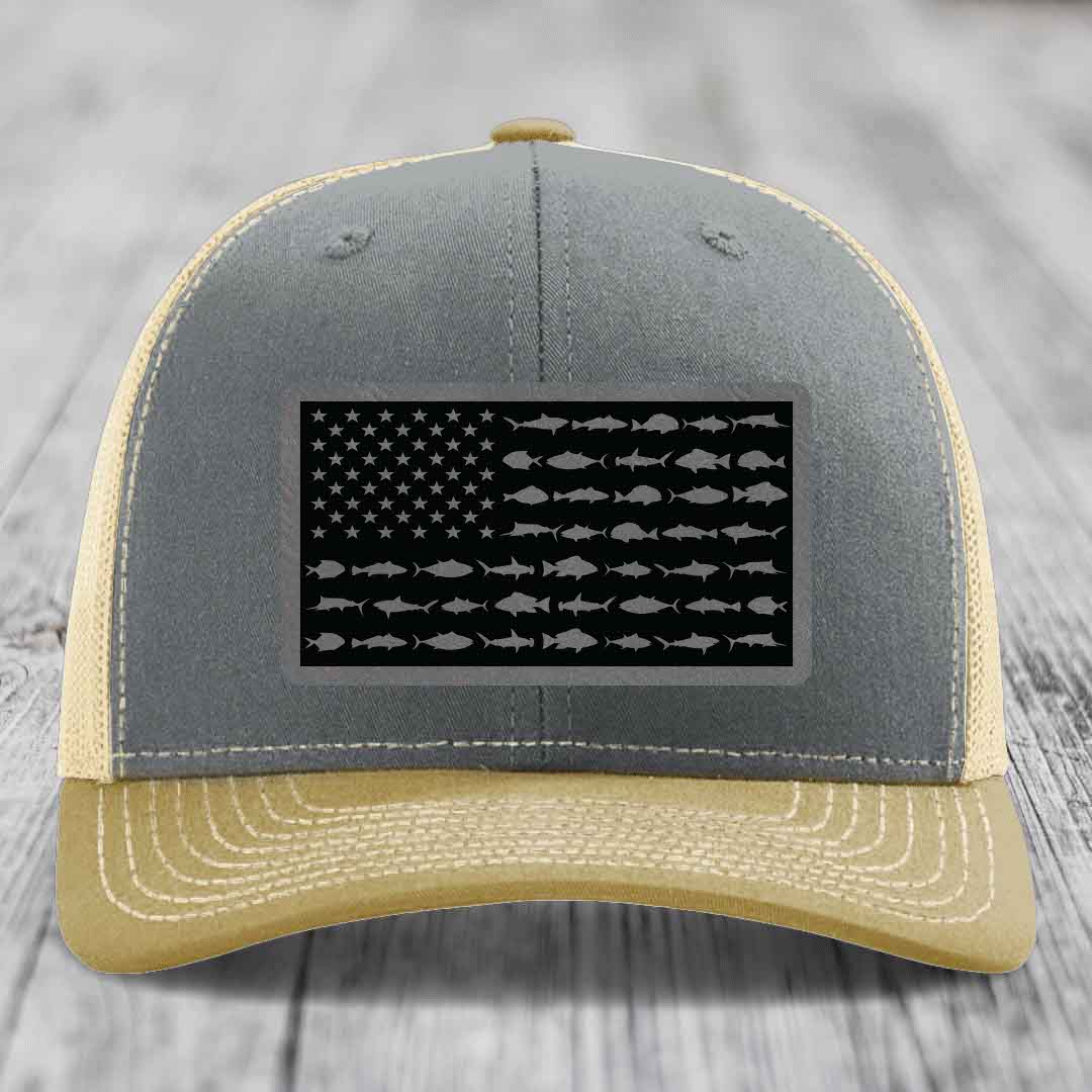 Grey and beige trucker hat with American flag patch made of saltwater fish silhouettes.