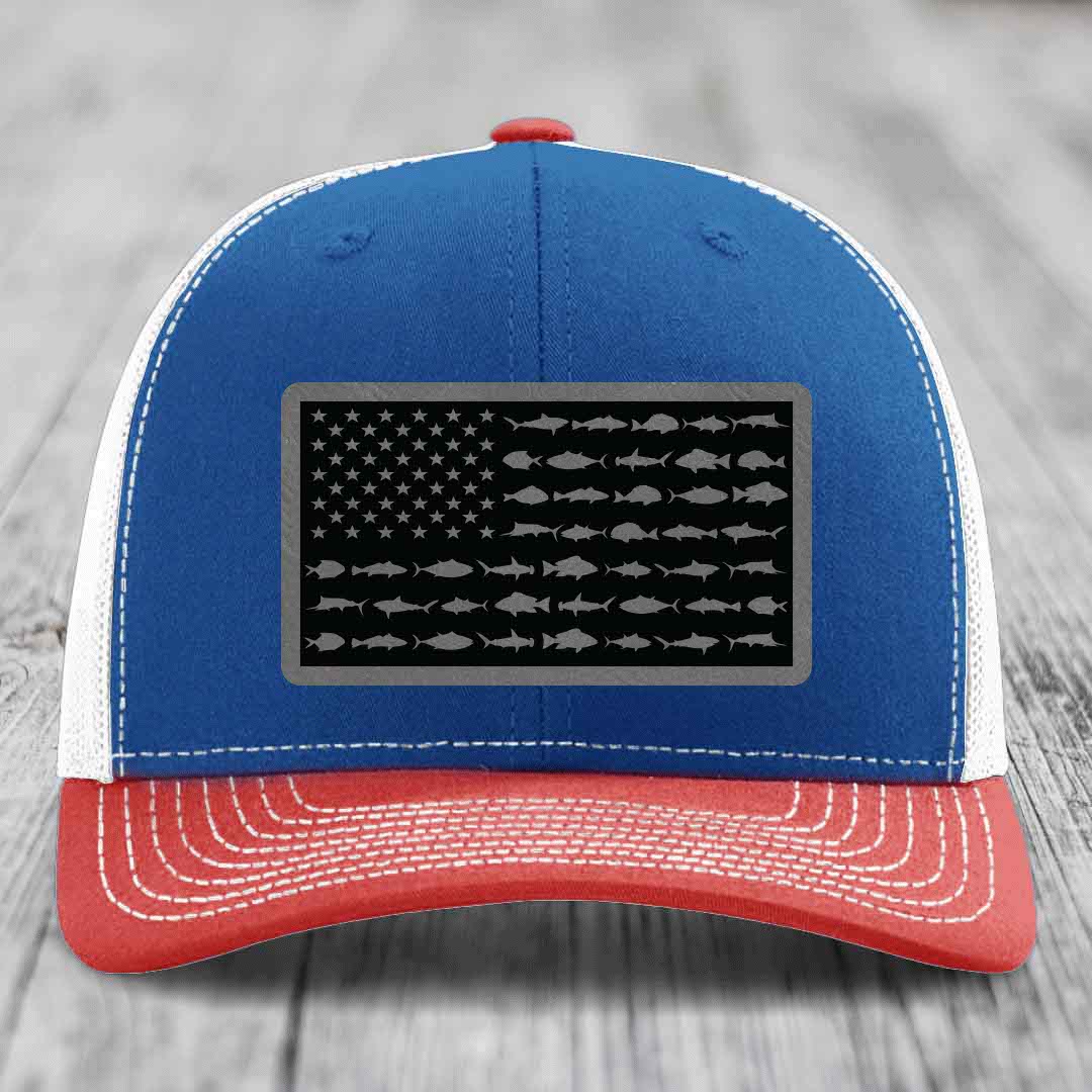Blue and red trucker hat with American flag patch made of fish silhouettes.