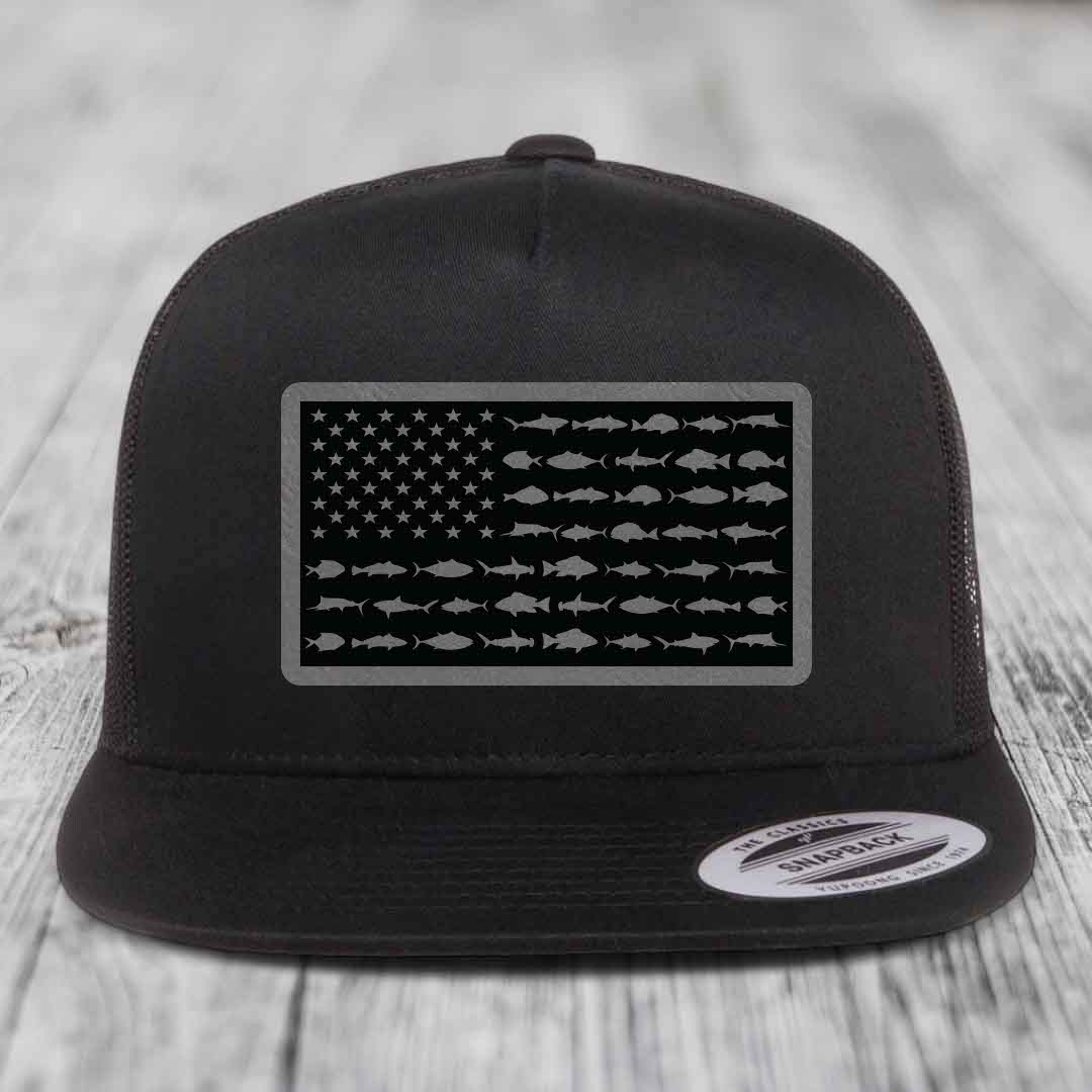 Black trucker hat with American flag patch made of saltwater fish silhouettes.