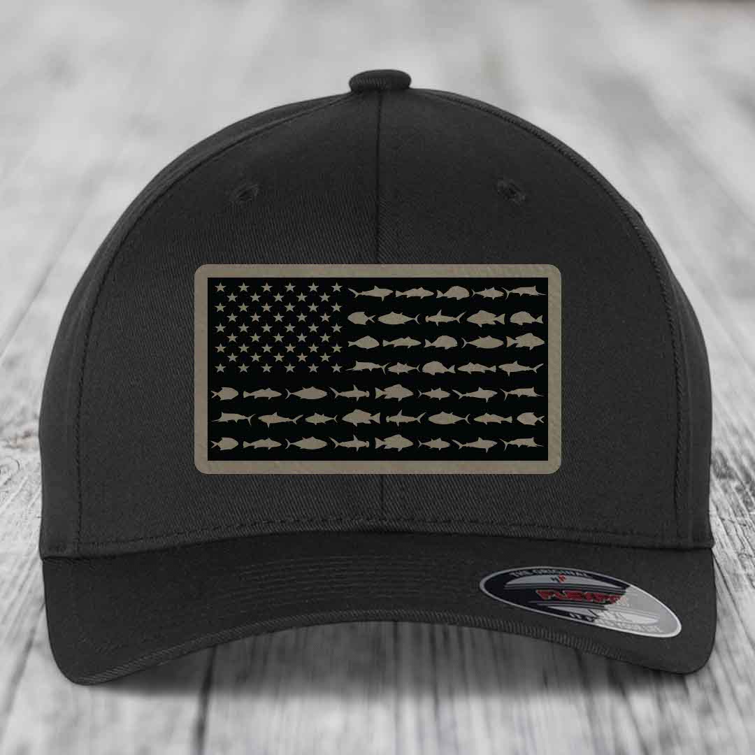 Black baseball cap with American flag patch made of saltwater fish silhouettes.