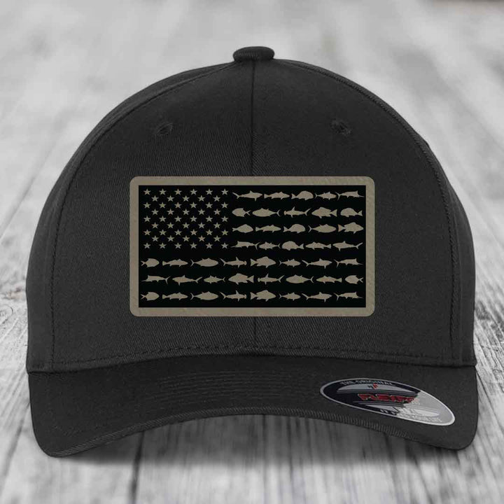 Black baseball cap with American flag patch made of saltwater fish silhouettes.