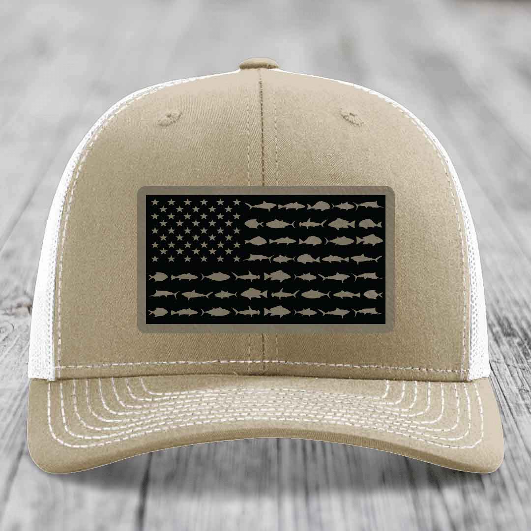 Tan trucker hat with American flag patch made of saltwater fish silhouettes.