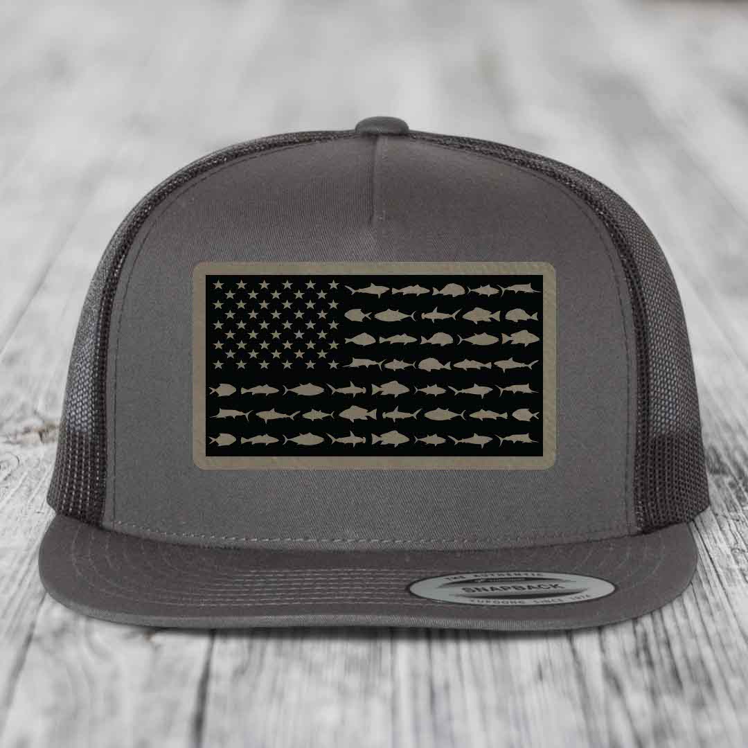 Grey trucker hat with American flag patch made of fish silhouettes.