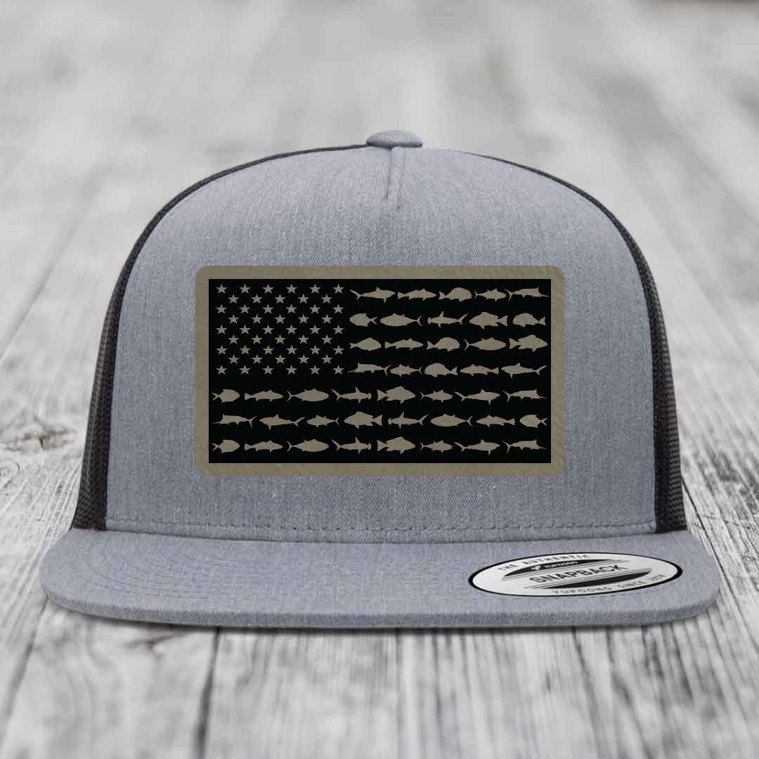 Grey trucker hat with American flag patch made of saltwater fish silhouettes.