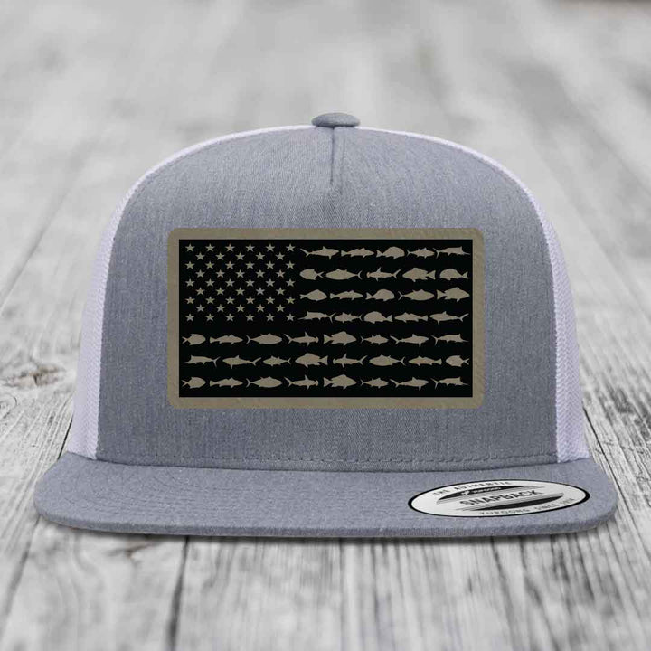 Grey trucker hat with American flag patch made of saltwater fish silhouettes.