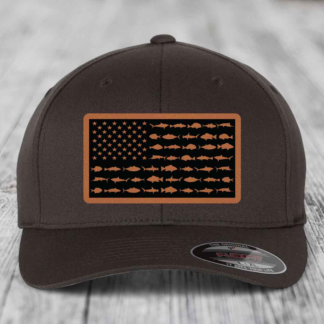 Dark brown baseball cap with American flag patch featuring fish silhouettes instead of stripes.