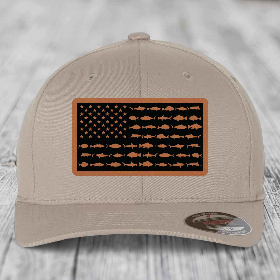 Beige baseball cap with American flag patch featuring fish silhouettes instead of stars and stripes.