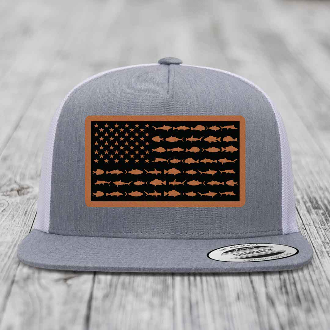 Grey trucker hat with a saltwater fish flag patch on the front.