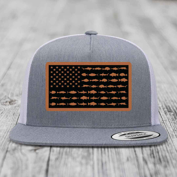 Grey trucker hat with a saltwater fish flag patch on the front.