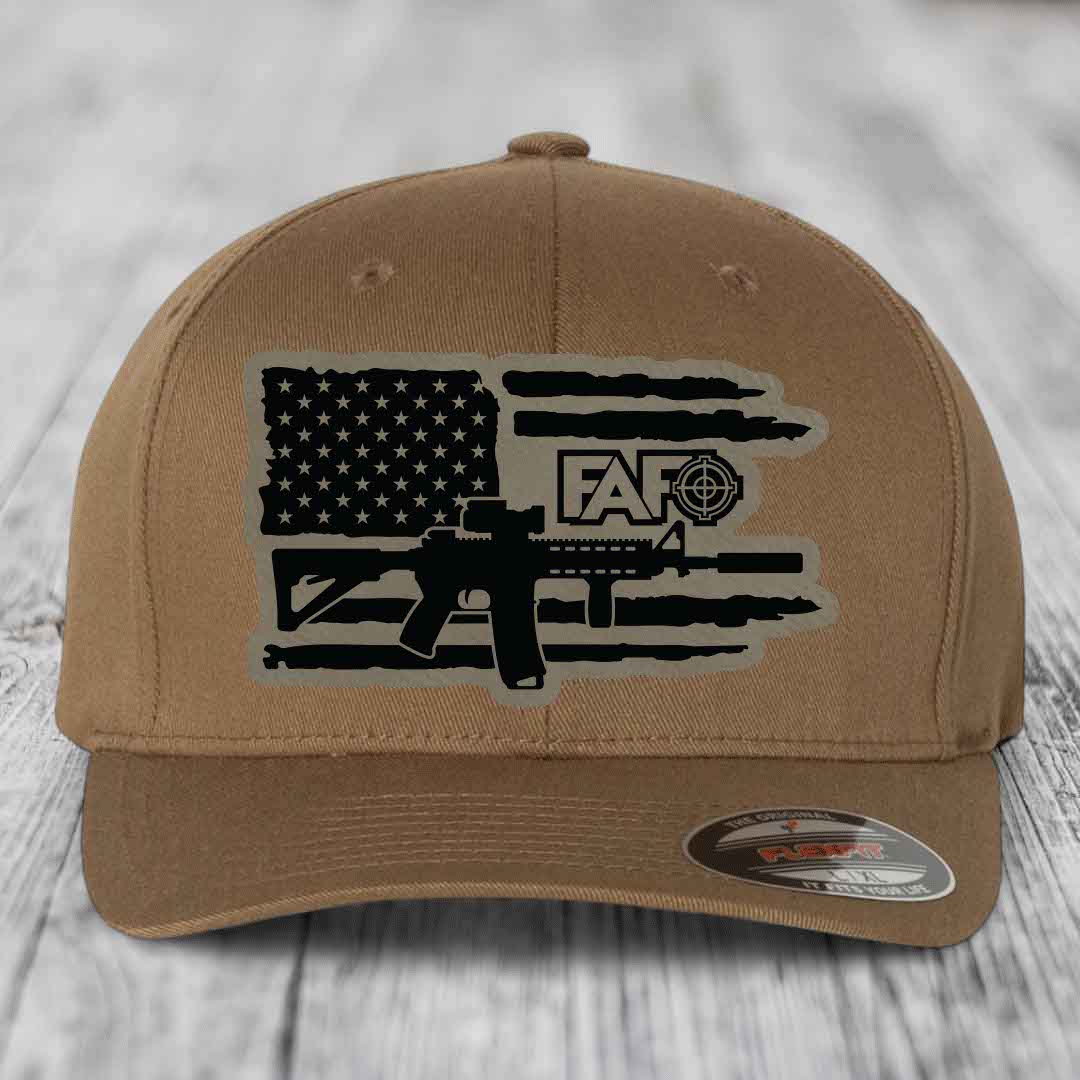 Tan baseball cap with black American flag patch featuring AR15 and FAFO logo.