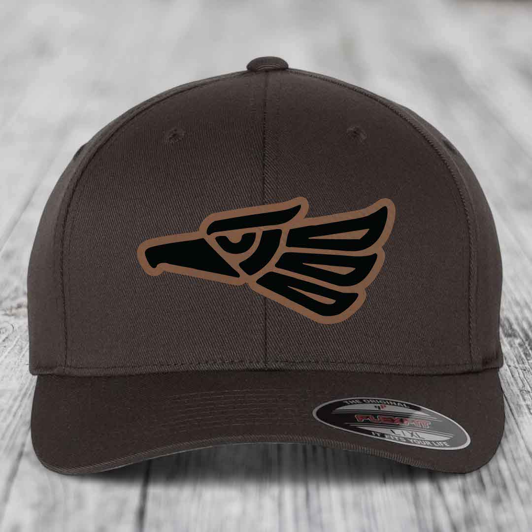 Dark brown Flexfit hat with Aztec-style eagle patch in black and tan.