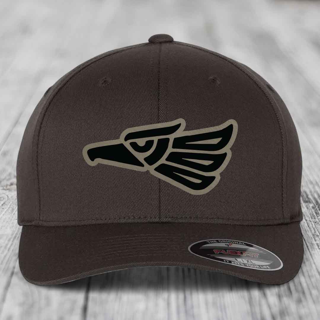 Brown Flexfit hat with Aztec eagle patch featuring black and tan design.