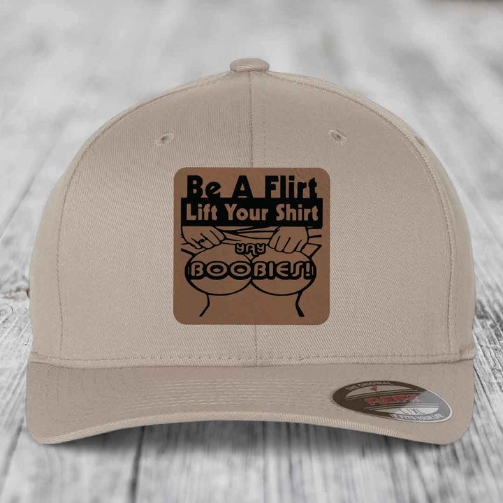 Be A Flirt Lift Your Shirt Yay Boobies! tan baseball cap with brown leather patch