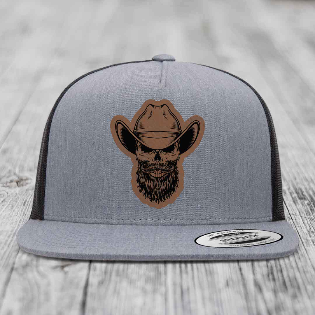 Bearded Cowboy Skull - Leather Patch Hat - Dark Brown to Black Patch - Yupoong 6006 Snapback Flatbill Hat