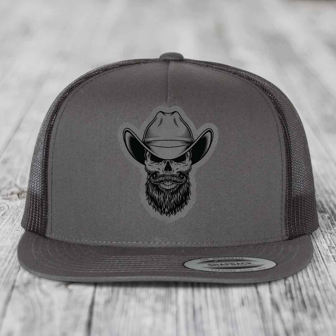 Bearded Cowboy Skull - Leather Patch Hat - Grey to Black Patch - Yupoong 6006 Snapback Flatbill Hat