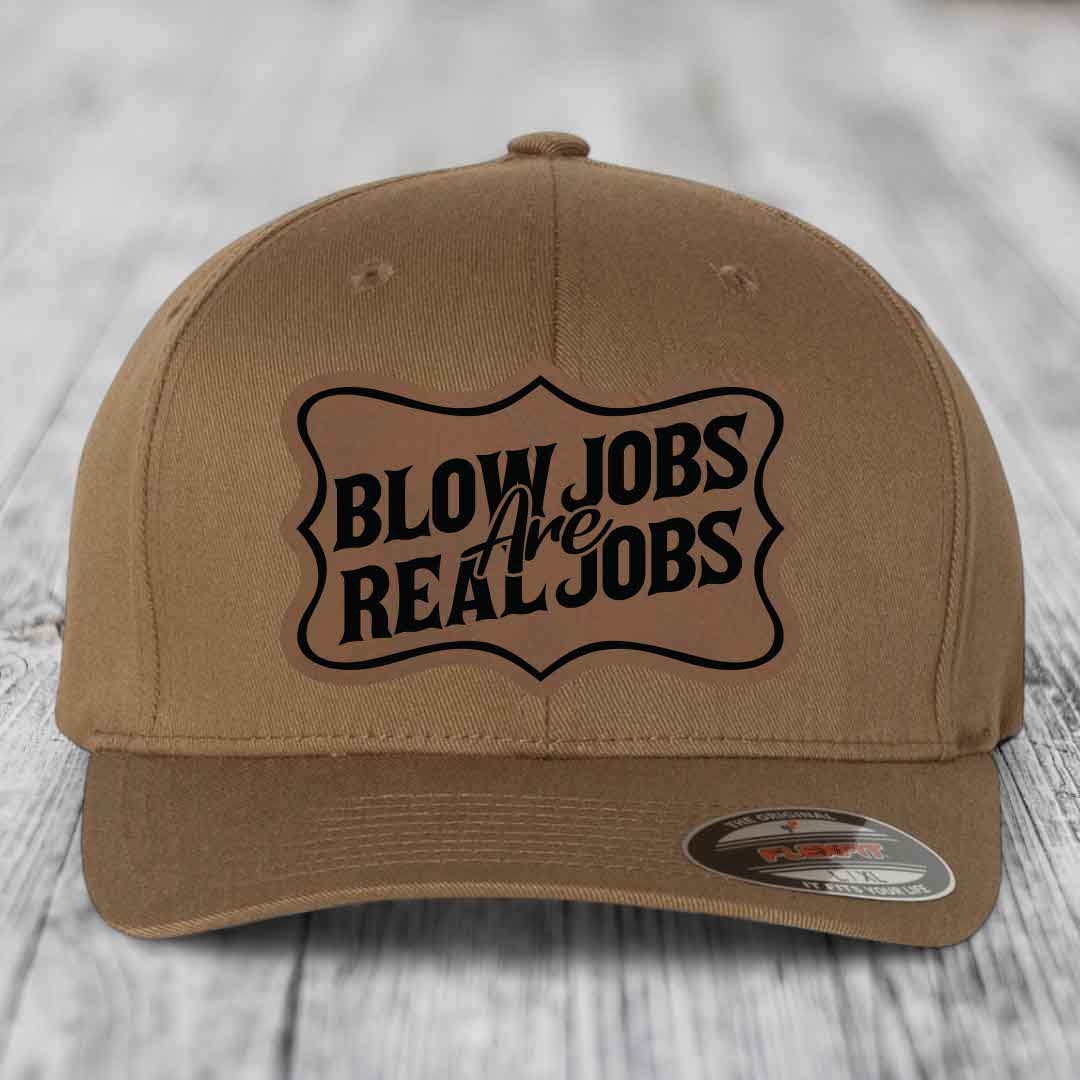 Tan baseball cap with black &