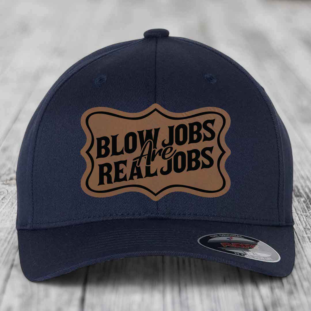 Dark blue baseball cap with a brown leatherette patch that reads &