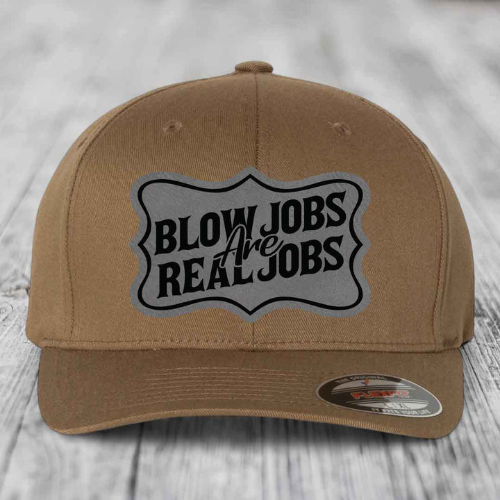 Tan baseball cap with black and grey &