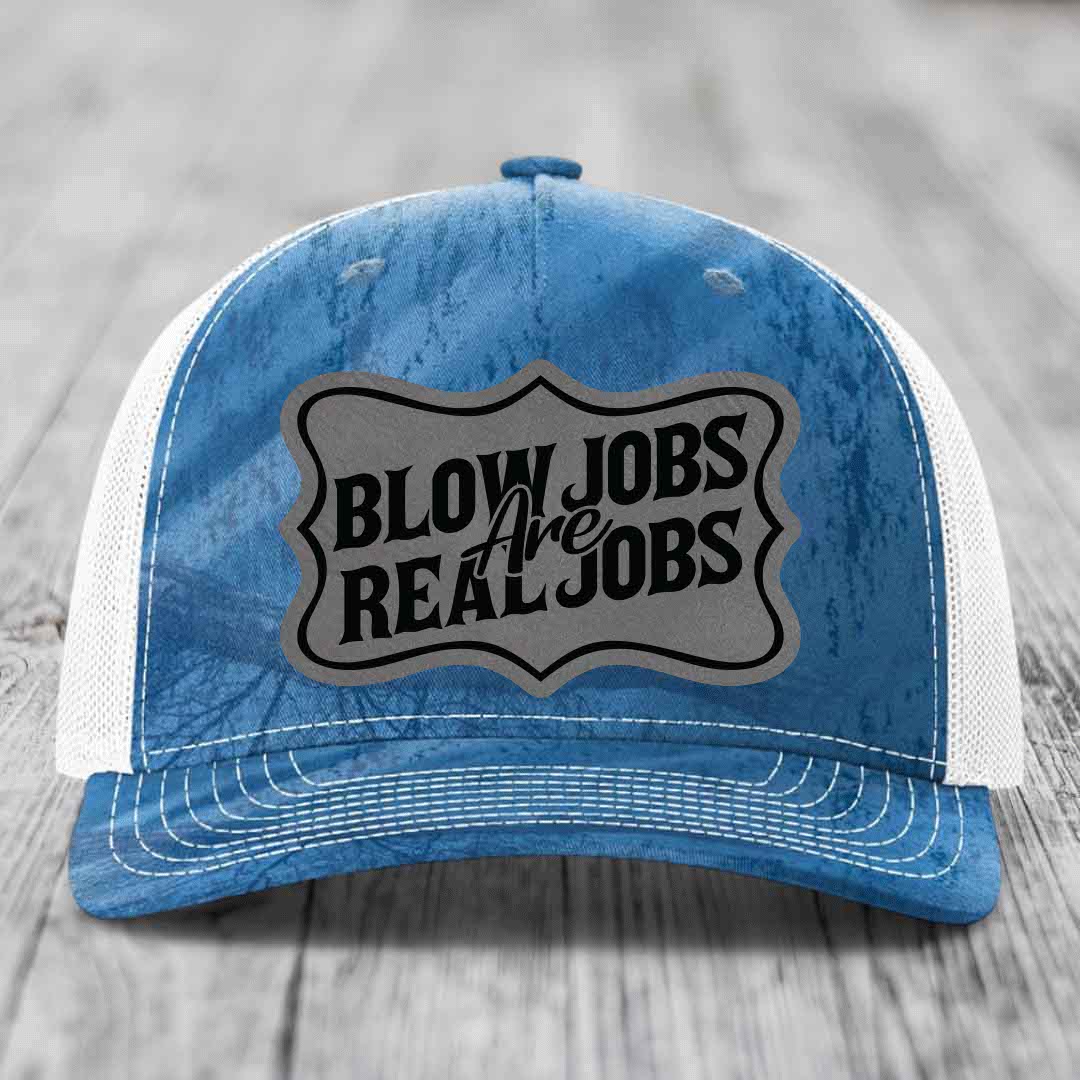 Blue and white trucker hat with a grey patch that reads &