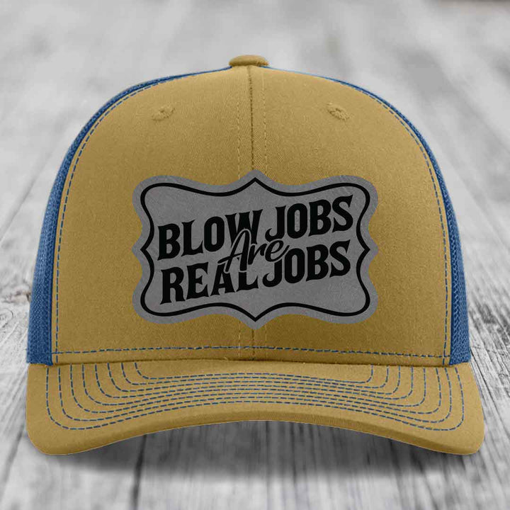 Tan and blue trucker hat with &