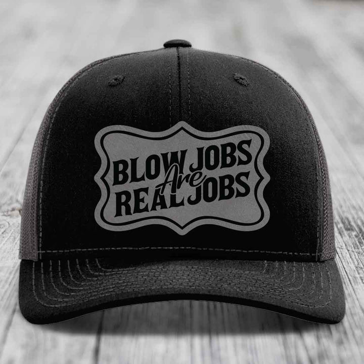 Black trucker hat with &
