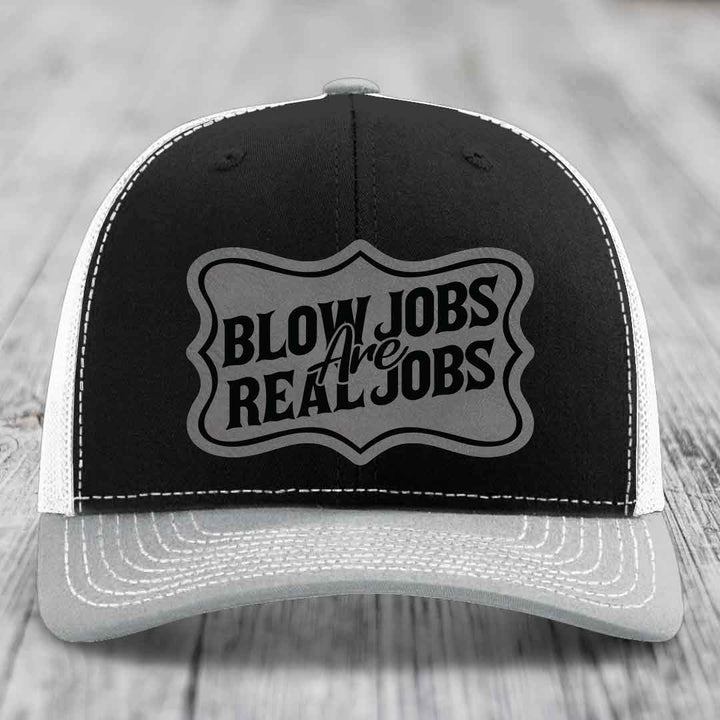 Black and white trucker hat with &