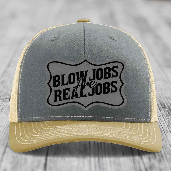 Grey and beige trucker hat with &