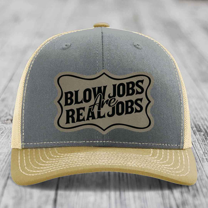 Grey and beige trucker hat with &
