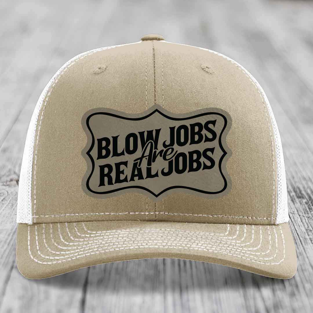 Tan trucker hat with black &