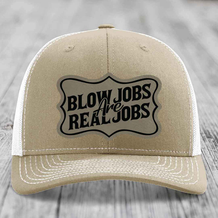 Tan trucker hat with black &
