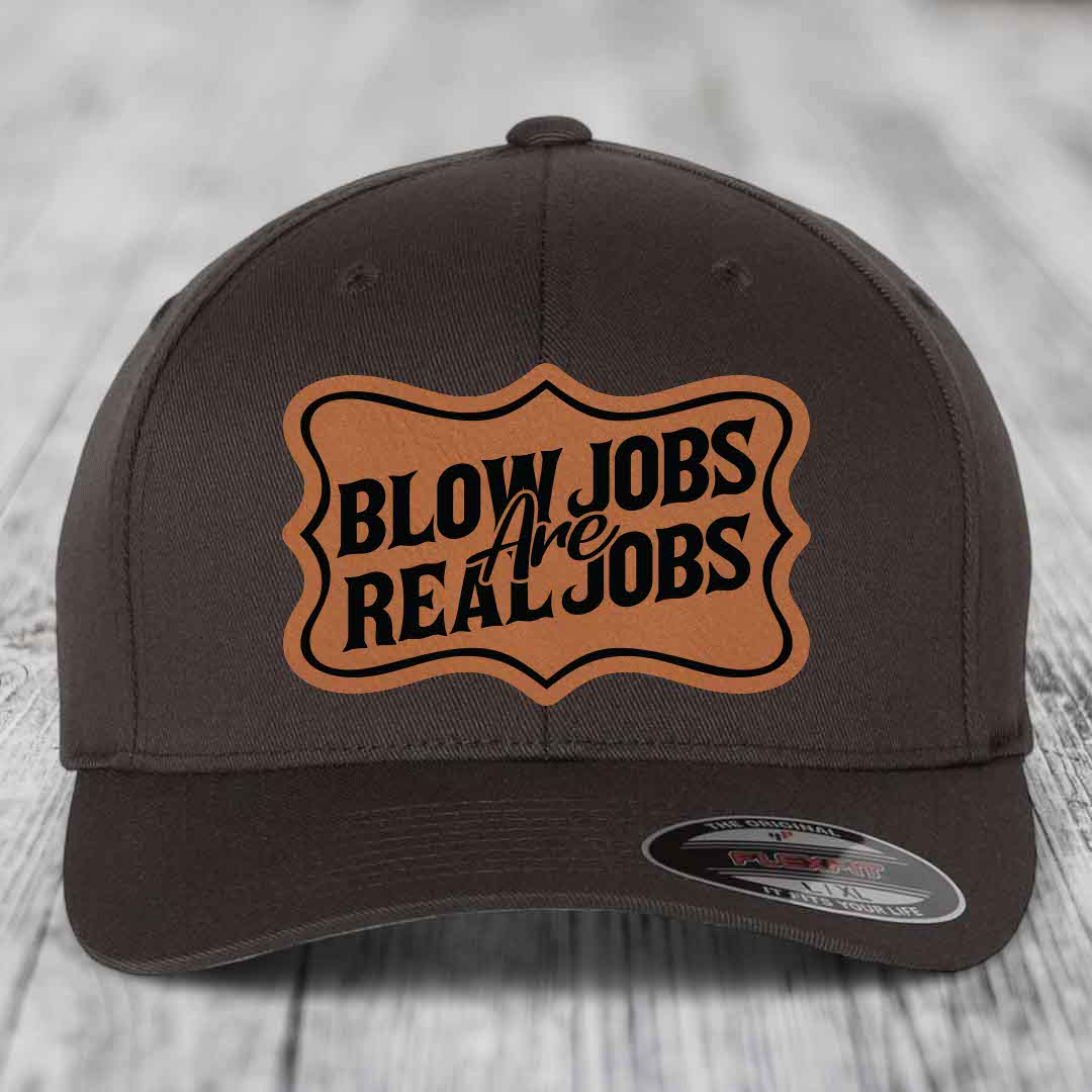 Dark brown Flexfit hat with tan leatherette patch reading &