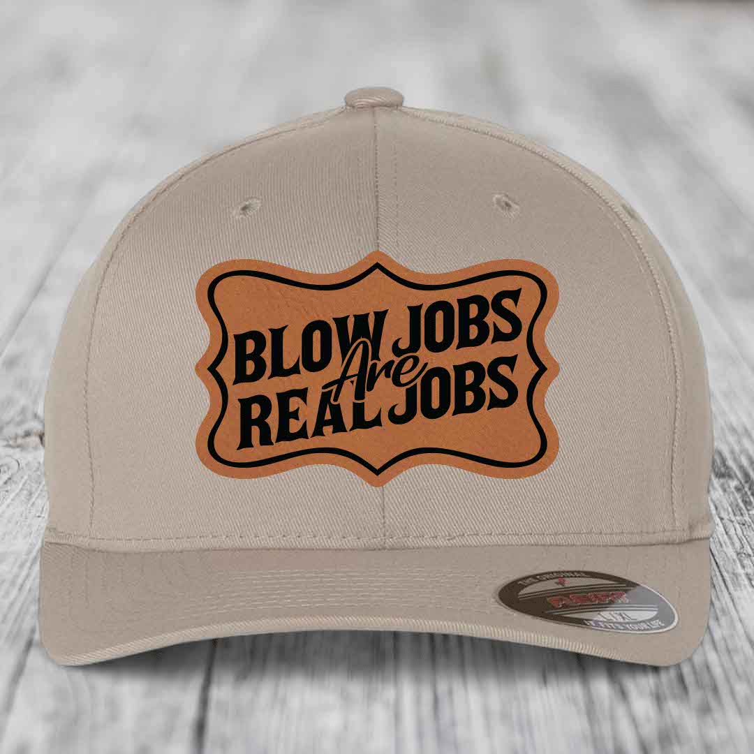 Beige baseball cap with brown leatherette patch reading &