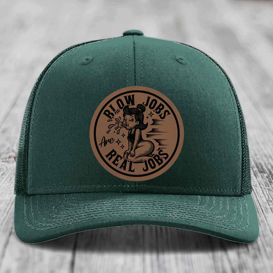 Green trucker hat with brown circular leather patch reading &