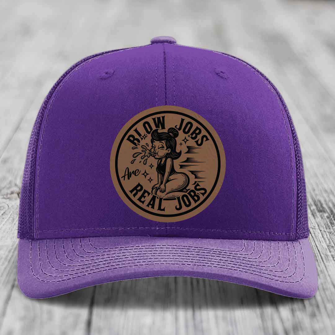 Purple trucker hat with brown circular patch reading &