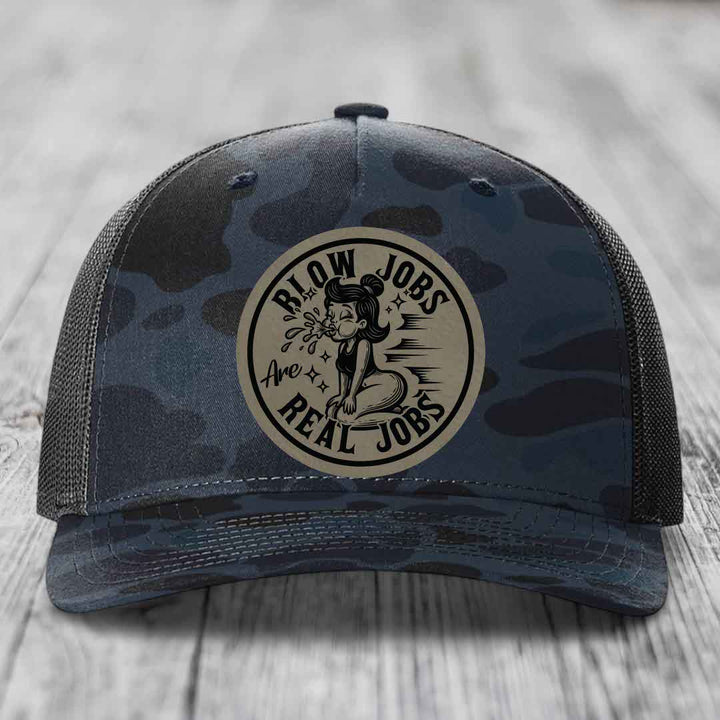 Camouflage trucker hat with circular patch reading &