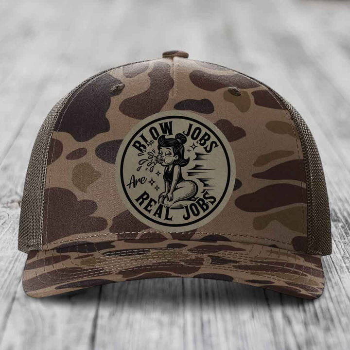 Camouflage trucker hat with circular patch reading &