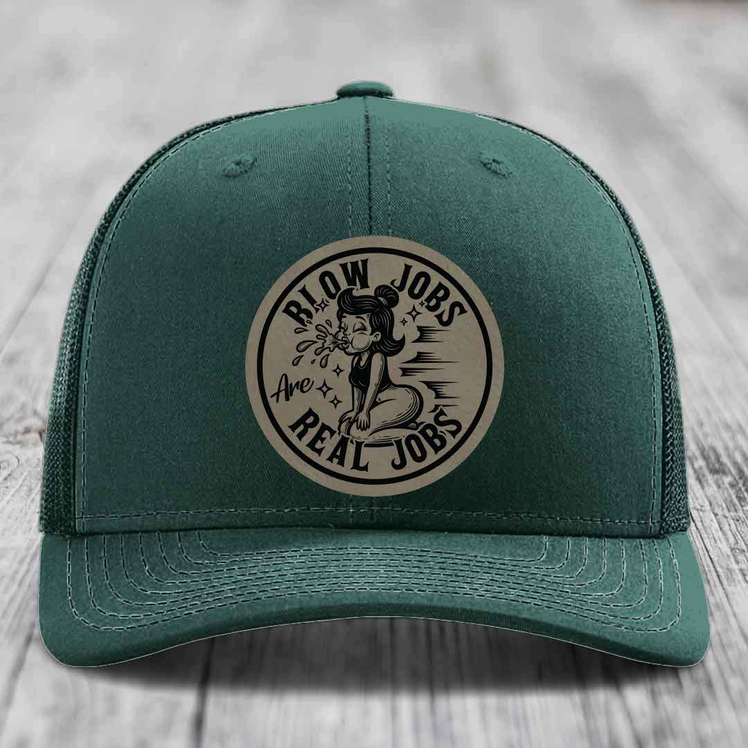 Green trucker hat with circular beige patch reading &