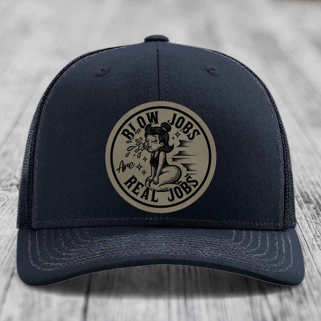 Dark blue trucker hat with beige circular patch reading &