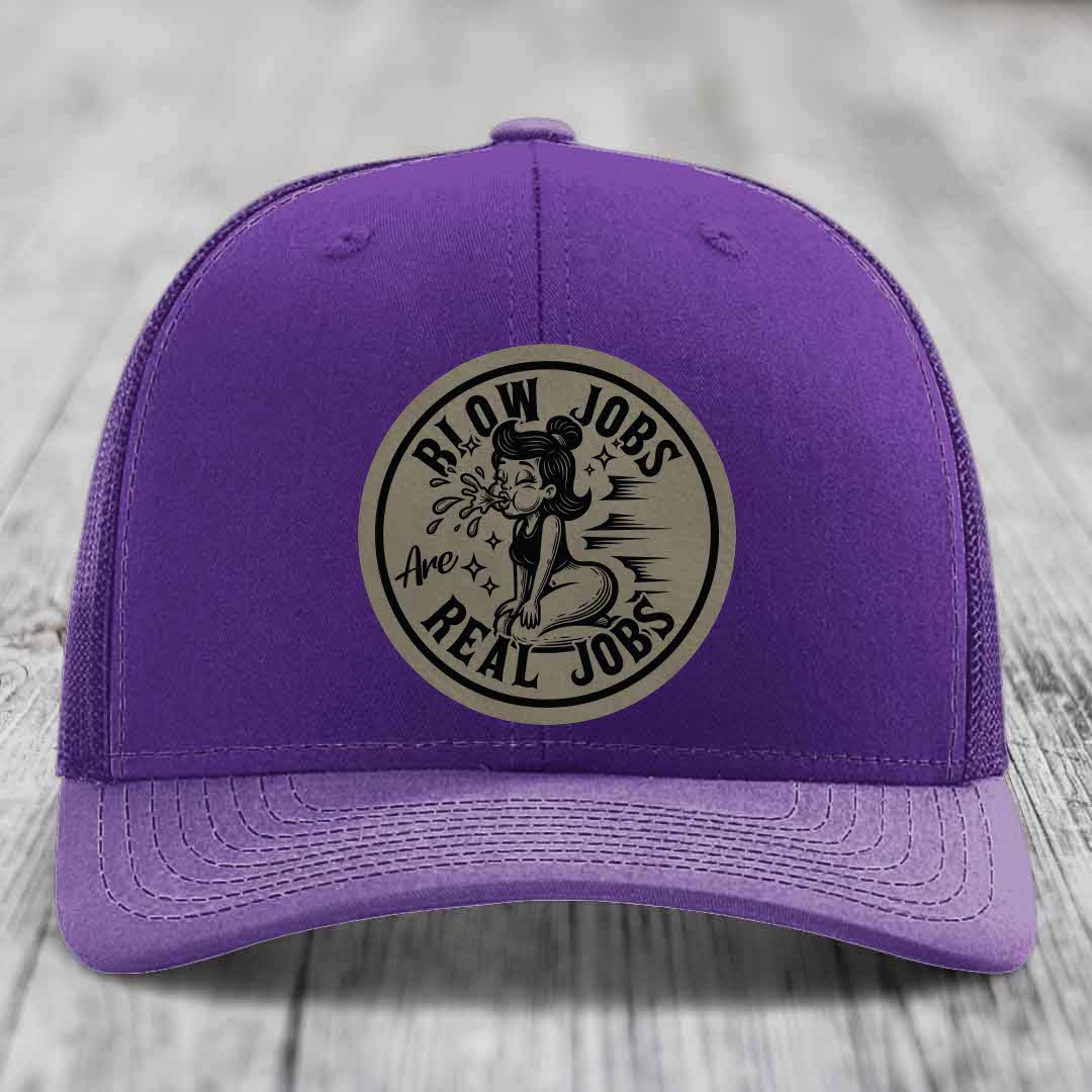 Purple trucker hat with circular beige patch showing cartoon woman and text &