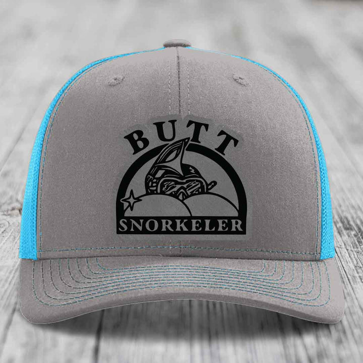 Grey trucker hat with blue mesh sides and black &