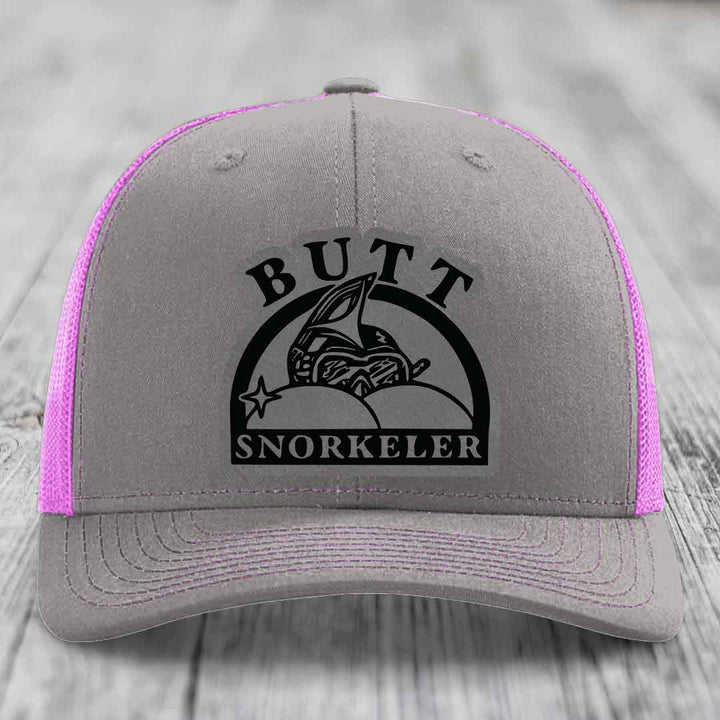 Grey trucker hat with pink mesh sides and black &